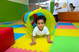 Toddler playing in a child's playroom